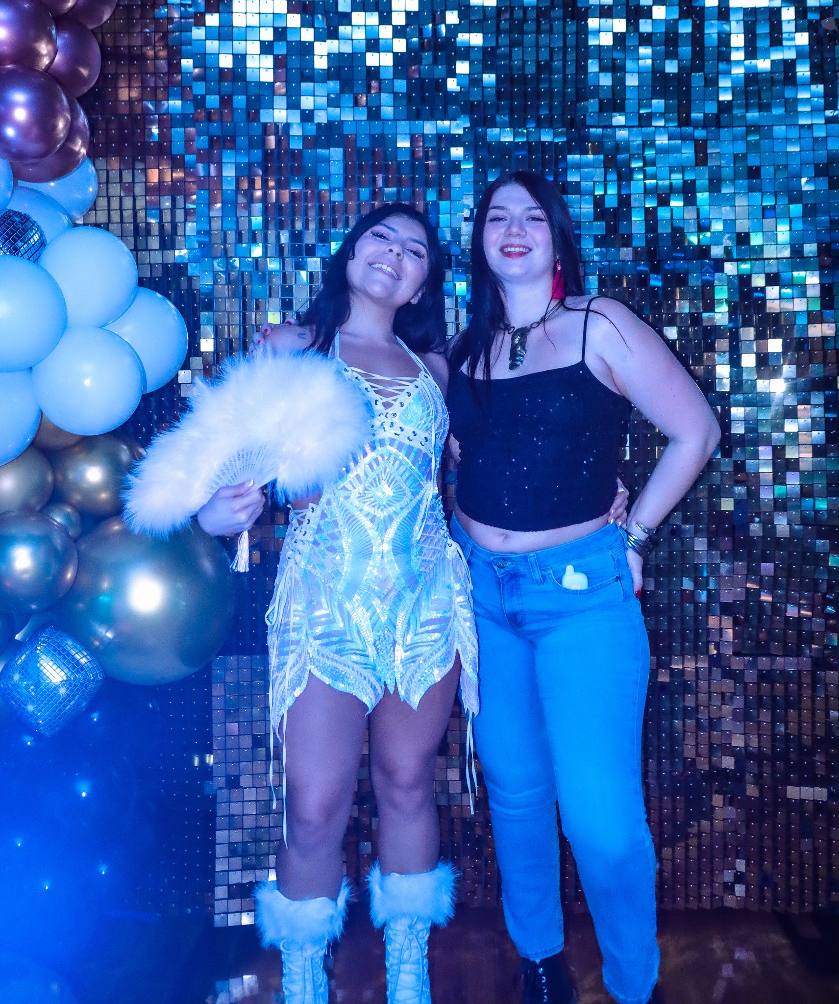 DJ booth with LED visuals and fog machine at Y2K25